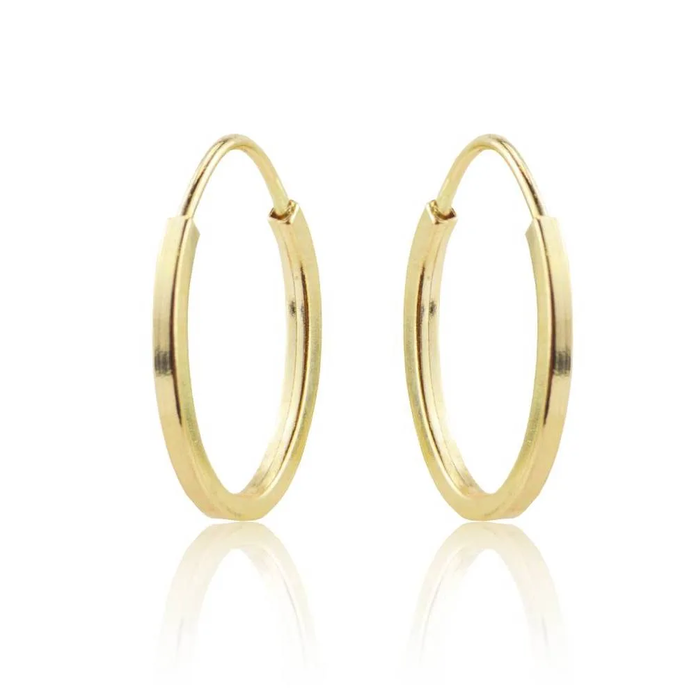 Brinco argola oval em ouro 18k da Ivan Joias